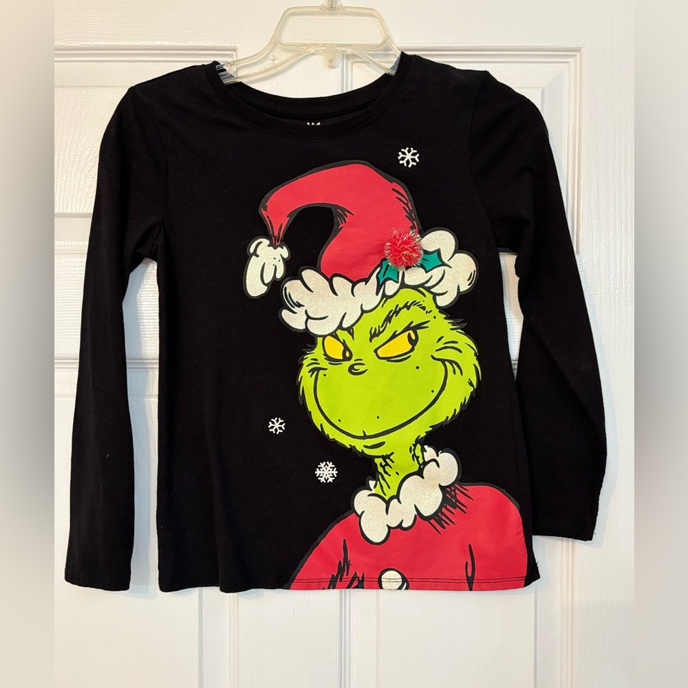 Girls black long sleeve shirt , size 10-12 never been worn.